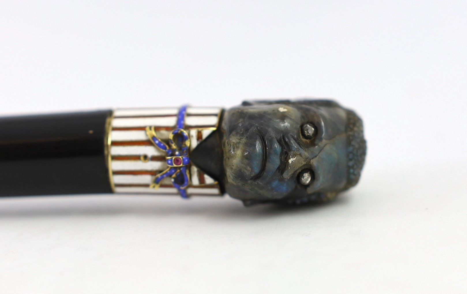 A 19th century French carved labradorite, diamond, ruby and enamel handled ebonised cane, 91cm